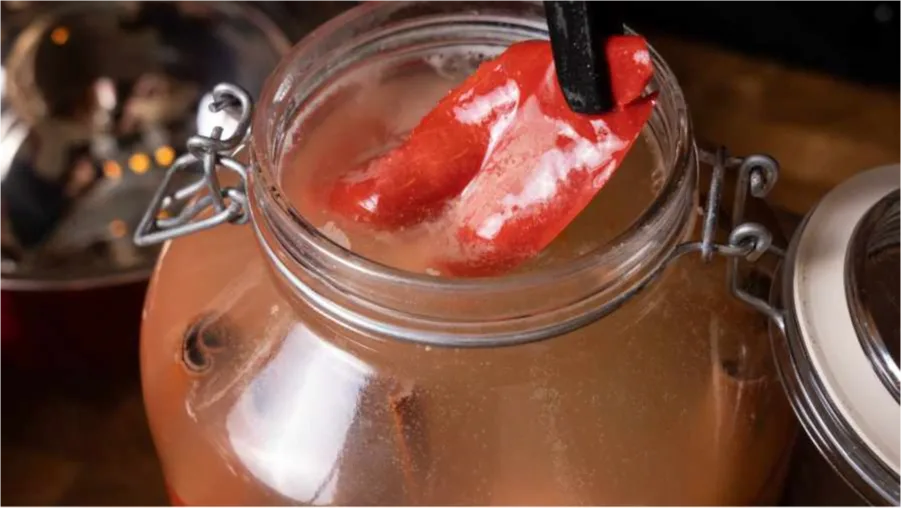What causes the change in color of fermented vegetables?